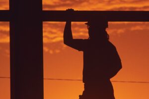 Silhouette of a construction worker on site